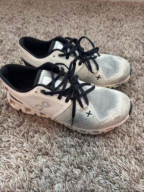 On Running Women’s White and Black Lace-Up Sneakers